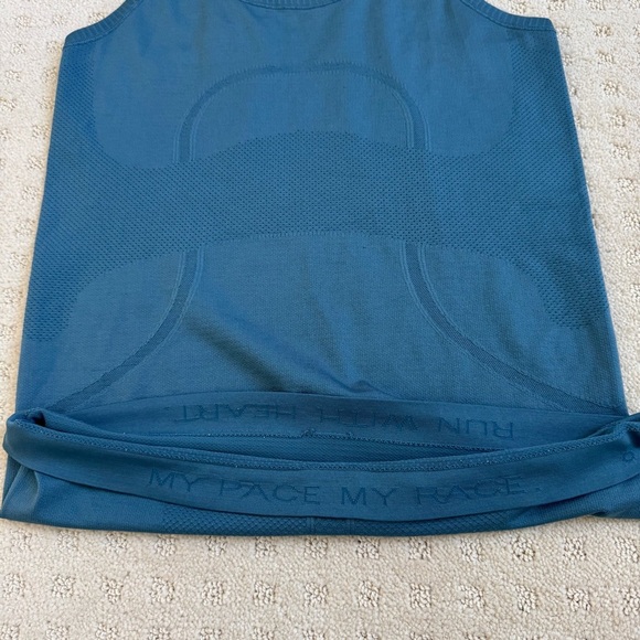 Lululemon Swiftly Tech Racerback in blue illuminight
Size 6 - Picture 6 of 8